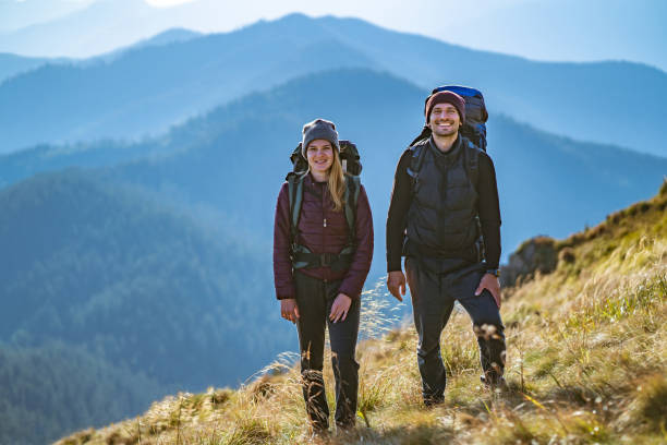 istock The attractive couple standing on the mountain 1145304936