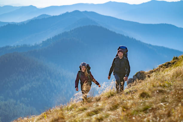 istock The young couple going to the mountain 1145306511
