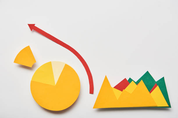 istock top view of paper chart and graphs, pointer on white background 1145308742