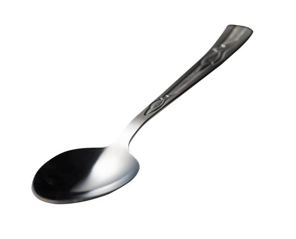 istock spoon isolated on white background. metal spoon. vintage spoon. 1145314279