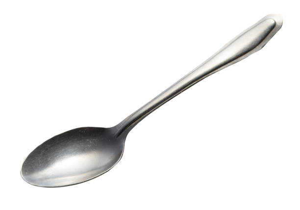 istock spoon isolated on white background. metal spoon. vintage spoon. 1145314289