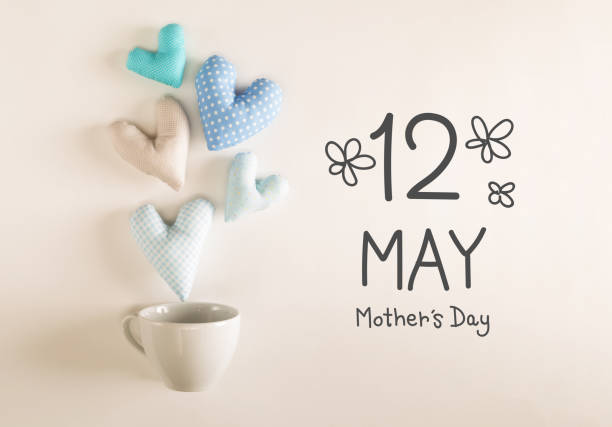 istock Mother's Day message with blue heart cushions 1145315069