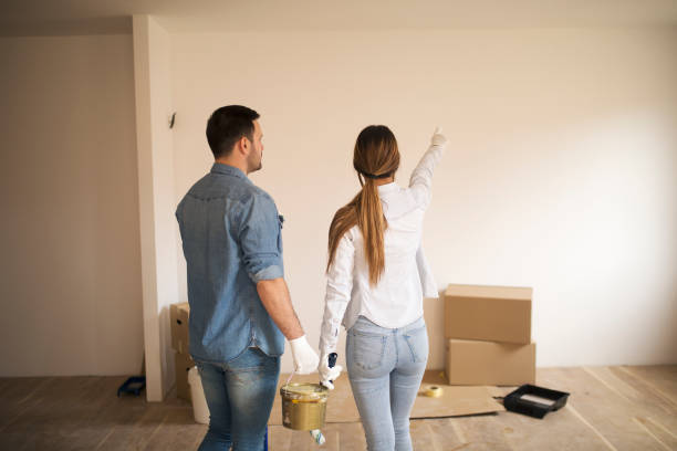 istock Young couple renovating apartment. 1145315497