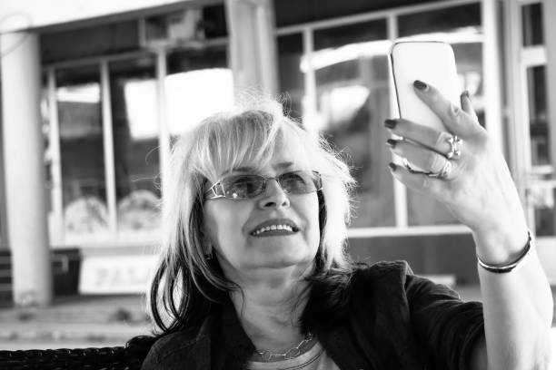 istock Mature woman taking selfies 1145315660
