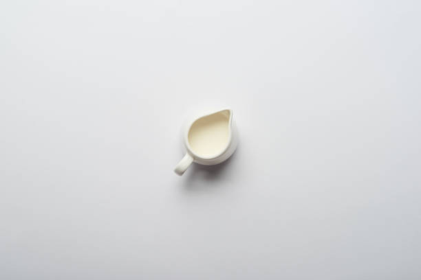 istock top view of white jar with fresh milk on grey background 1145321766