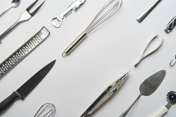 istock flat lay with metal cooking utensils on grey background 1145321769