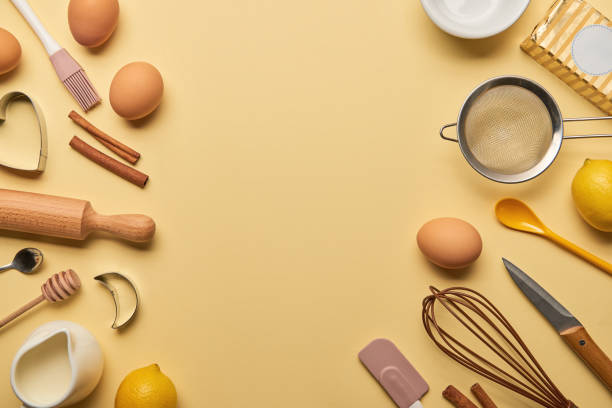 istock top view of bakery ingredients and kitchenware on yellow background 1145321863