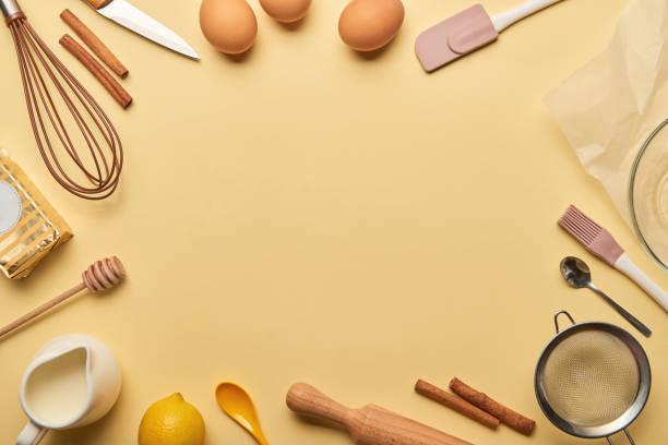 istock top view cooking utensils and ingredients frame on yellow background with copy space 1145321899