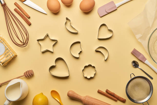 istock top view of bakery ingredients and cooking utensils around dough molds 1145321907