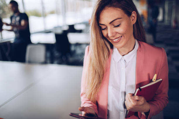 istock Young successful business woman in her office 1145329421