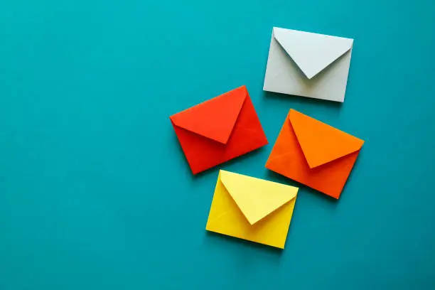 Photo of Four multi-coloured envelopes