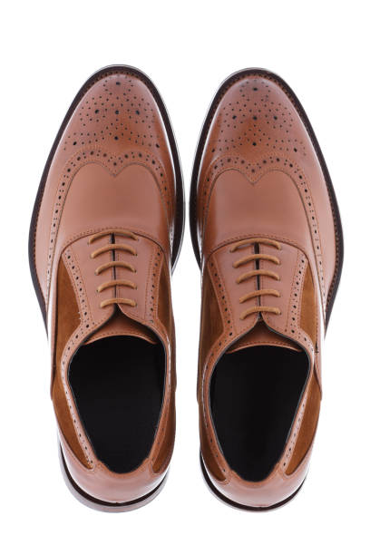 istock Men's brown shoes isolated on a white background 1145345596