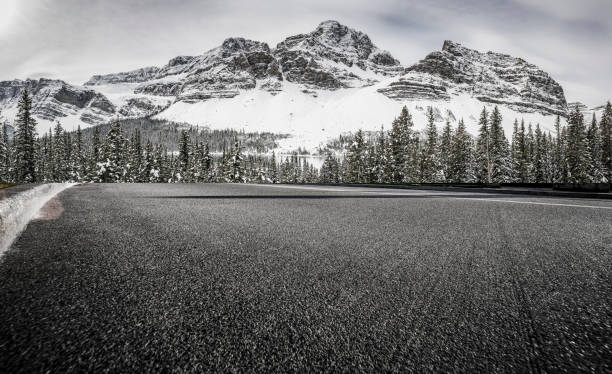 istock road towards rocky mountains 1145381199