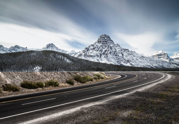 istock road towards rocky mountains 1145382645