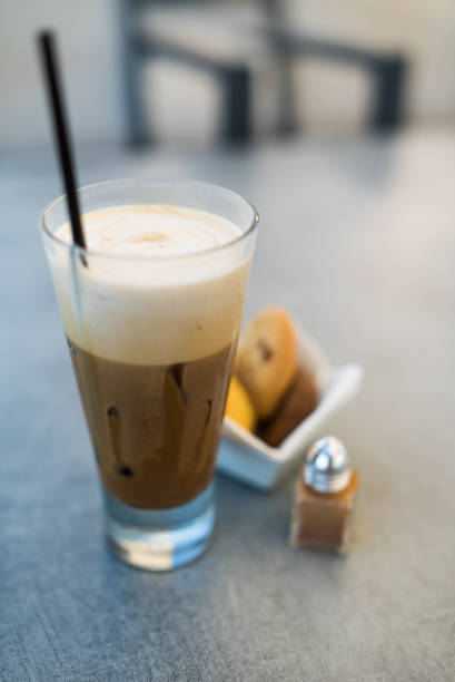 Cold Cappuccino Coffee Close up shot of a freddo cappuccino coffee. Freddo cappuccino is a cold variation of cappuccino espresso coffee. It is very popular way of enjoying coffee in Greece, especially at the Greek seaside. freddo cappuccino stock pictures, royalty-free photos & images