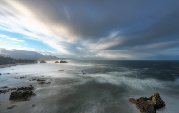 Stormy sea and breaking waves big sur coastline,california,usa. storm cloud sky dramatic sky cloud stock pictures, royalty-free photos & images