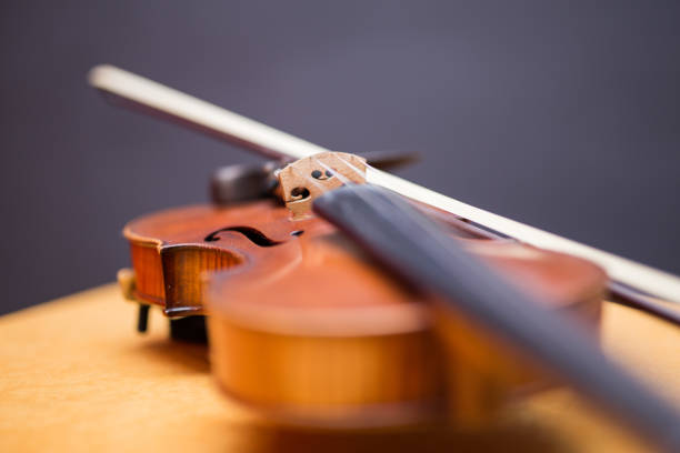 istock Violin instrument on the table. Close up. 1145389692