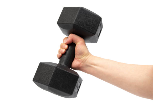 istock Man hand holding dumbbells on a white background. 1145390638