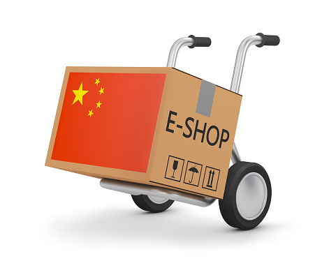 Cardboard box with Chinese flag on a hand cart. 3d render