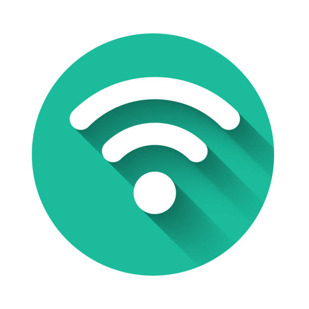 istock White Wi-Fi wireless internet network symbol icon isolated with long shadow. Green circle button. Vector Illustration 1145394490