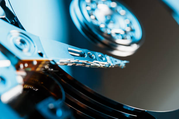 istock Disassembled hard drive from the computer, hdd with mirror effect. Opened hard drive from the computer hdd with mirror effects. Part of computer pc, laptop 1145400776