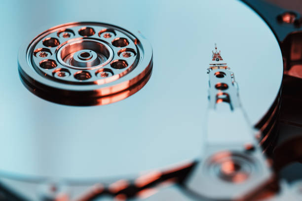 istock Disassembled hard drive from the computer, hdd with mirror effect. Opened hard drive from the computer hdd with mirror effects. Part of computer pc, laptop 1145400812