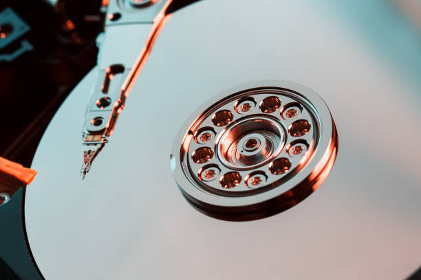 istock Disassembled hard drive from the computer, hdd with mirror effect. Opened hard drive from the computer hdd with mirror effects. Part of computer pc, laptop 1145400903