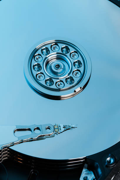 istock Disassembled hard drive from the computer, hdd with mirror effect. Opened hard drive from the computer hdd with mirror effects. Part of computer pc, laptop 1145401927