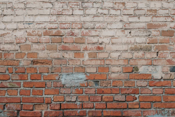 istock Old red brick wall background. Vintage abstract pattern of old red bricks. Grunge concrete cement background. Brown cement texture. Cement construction material for decoration design. Concrete surface. 1145402833
