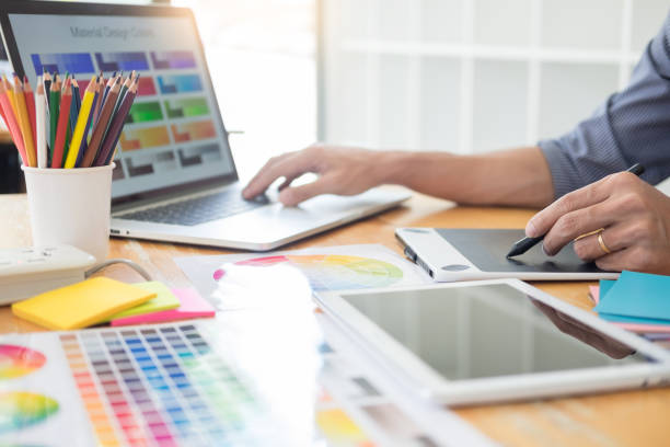 istock Midsection Of Design Professional Working On Desk 1145404937
