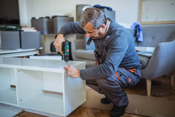 istock Senior man assembling furniture at home, a new home concept 1145407801