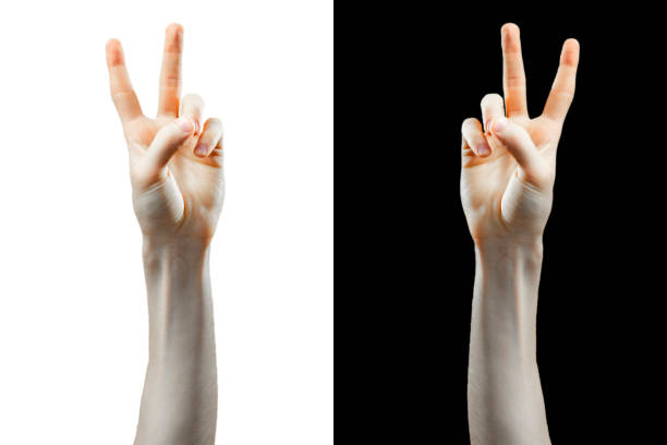 istock hand show peace sign isolated black and white background b 1145410255