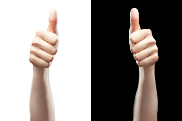 hand with thumb finger up isolated on black and white background