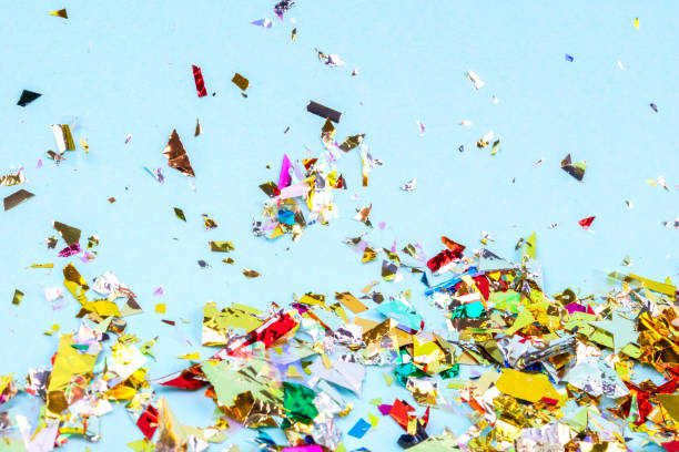 istock Colorful celebration background with confetti,stars, fireworks and decoration on blue background. Flat lay. 1145411293