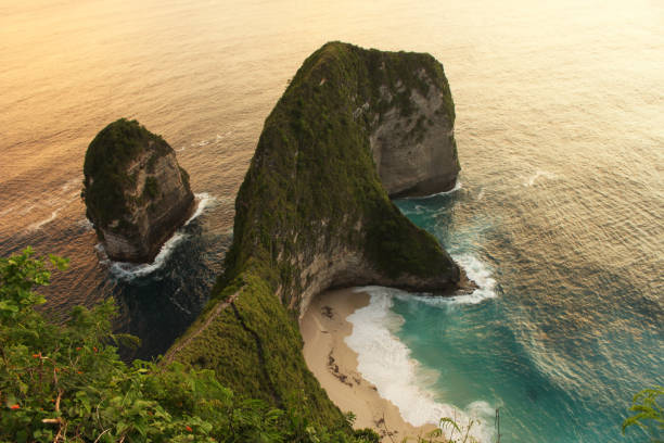 istock Aerial View Kelingking Beach at Sunset. 1145412289