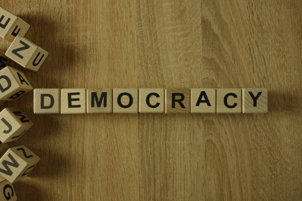 istock Democracy word from wooden blocks 1145415755