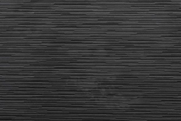 istock Black modern brick wall texture and background seamless 1145419124