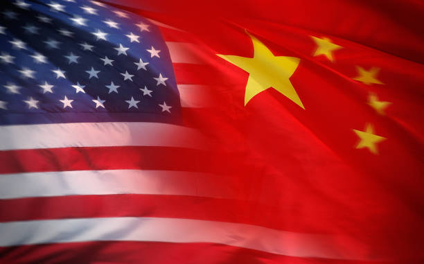 US and Chinese flag Flag of United States and China waving together chinese flag stock pictures, royalty-free photos & images