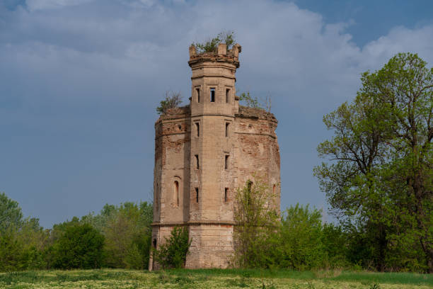 istock an old abandoned medieval castle in the forest with a beautiful sky 1145423802