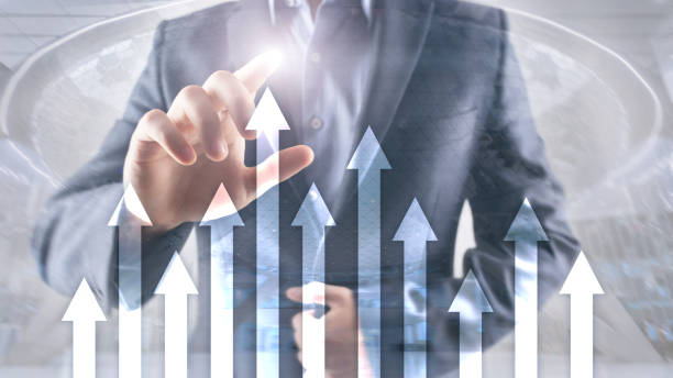 istock Up arrow graph on skyscraper background. Invesment and financial growth concept 1145424419