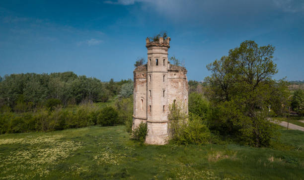 istock an old abandoned medieval castle in the forest with a beautiful sky 1145424511