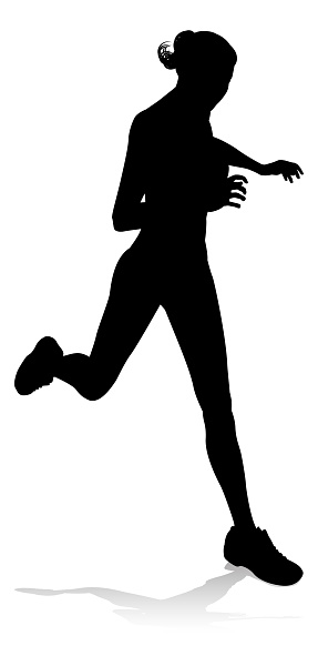 Silhouette runner in a race track and field event