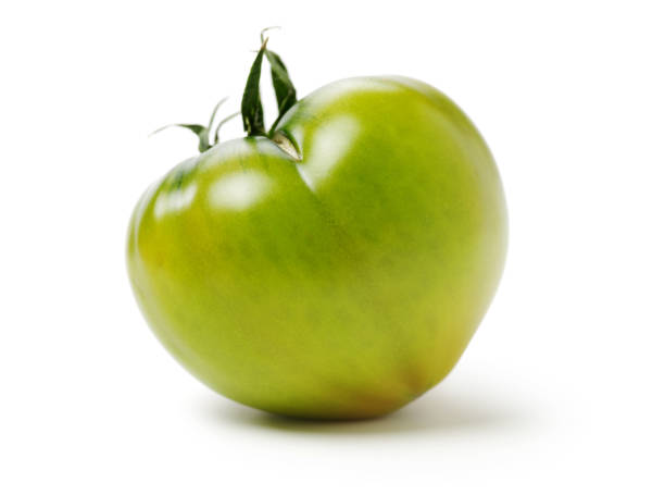 istock fresh green tomato isolated on white background 1145427522
