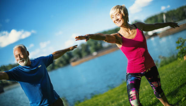istock Yoga class outdoors. 1145427542
