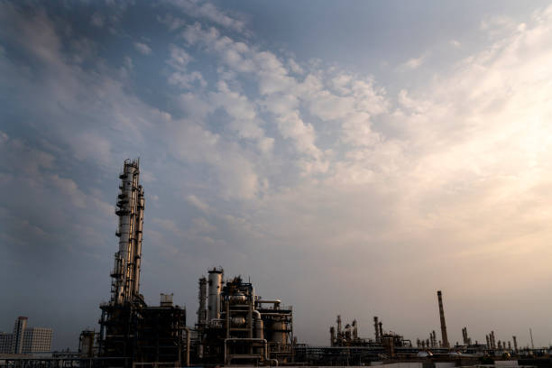 istock Oil refineries against a backdrop of blue skies and white clouds 1145432025