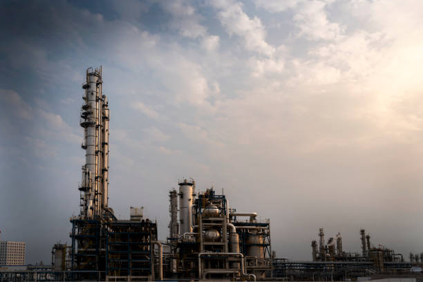 istock Oil refineries against a backdrop of blue skies and white clouds 1145432038
