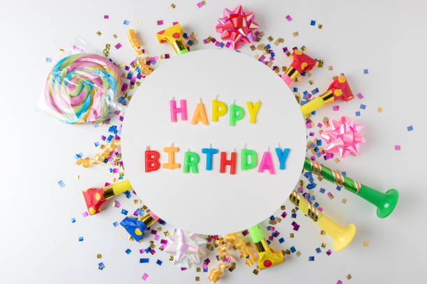 istock Colorful celebration background with various party confetti, streamers and decoration. Minimal party concept. Flat lay. 1145432404