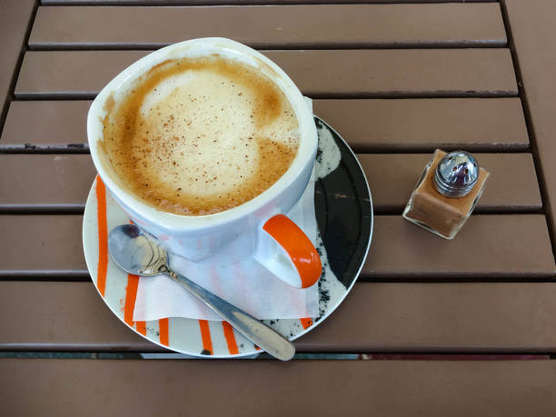istock Coffee with cinnamon in a street cafe 1145432635