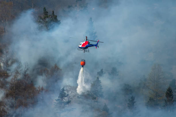 istock Helicopter extinguishing wildfire. Bergen, Norway. 1145434702