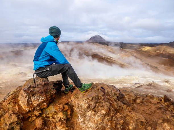 istock Iceland - Man and a geothermal region 1145438816